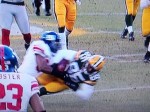 A. The ball is loose, but the ball carrier's shin is obscured.
