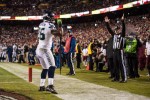 Head linesman Derick Bowers signals a touchdown by Seahawks fullback Michael Robinson. (Seattle Seahawks photo)