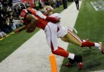 On the touchdown by Falcons receiver Julio Jones, side judge Gary Cavaletto and back judge Tony Steratore quickly confirm with each other on a very tight touchdown call. (Jimmy Cribb/Atlanta Falcons)