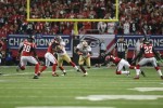 Umpire Carl Paganelli during a run by 49ers running back Frank Gore (San Francisco 49ers photo)