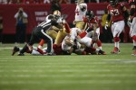 Umpire Carl Paganelli is about to separate a pile after a fumble recovery by the 49ers. (San Francisco 49ers photo)