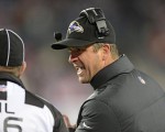 Ravens head coach John Harbaugh chats up head linesman Tony Veteri (Baltimore Ravens photo)