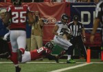 Side judge Rick Patterson watches the plane of the goal line as Seahawks receiver Golden Tate scores (Seattle Seahawks photo)