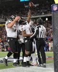 Back judge Perry Paganelli sends players back to the sideline as Ravens receiver Anquan Boldin celebrates a touchdown. (Baltimore Ravens photo)
