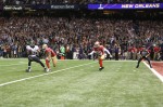 Back judge Dino Paganelli anchors himself on the goal line for the touchdown call after Ravens receiver Jacoby Jones got up from the ground untouched on a long completion. (Ben Liebenberg/NFL)