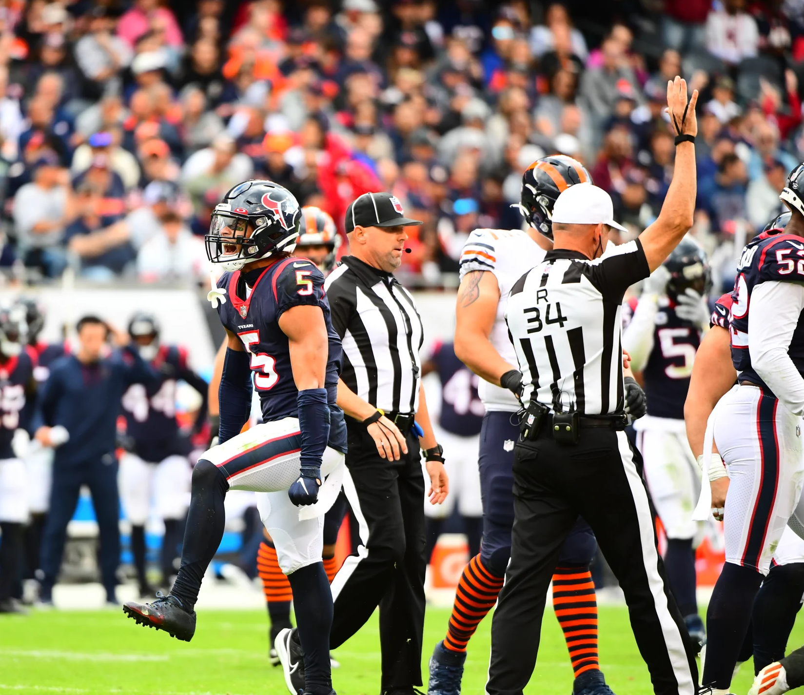 Tab Slaughter and Clete Blakeman (Texans)